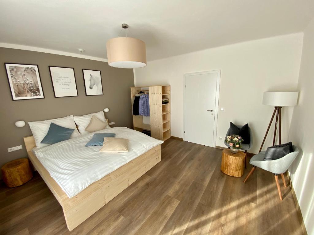 A bed or beds in a room at Haus Stadler - Self Check-in