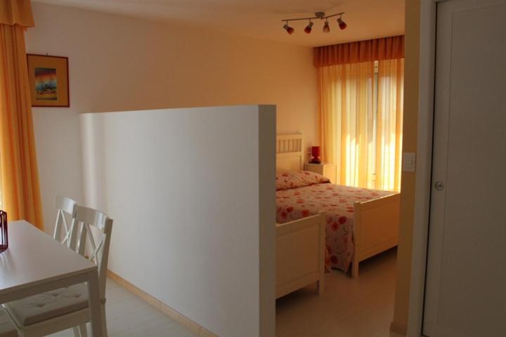 Postel nebo postele na pokoji v ubytování Hotel Capri