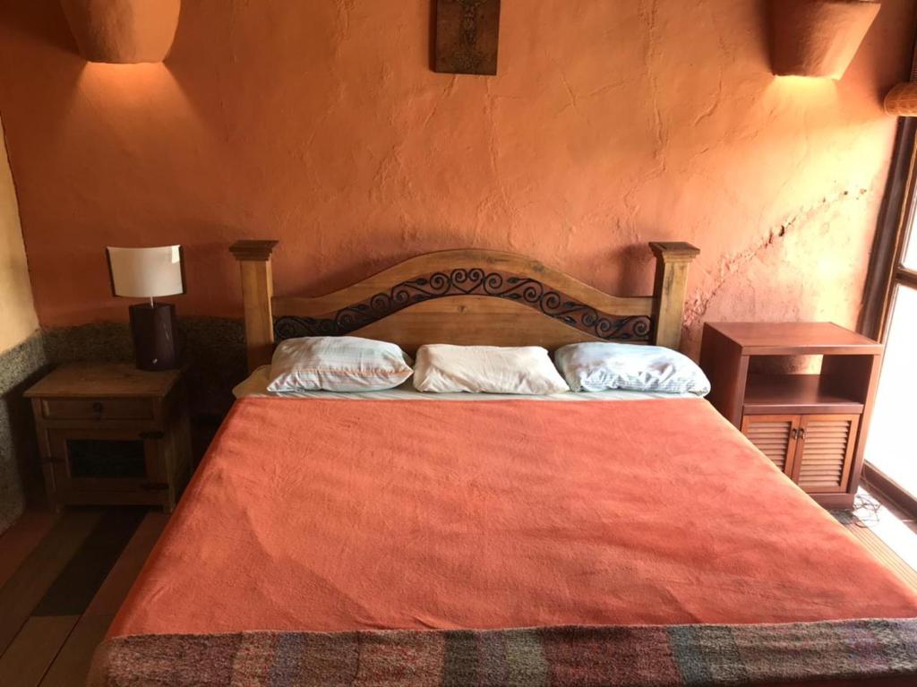 Giường trong phòng chung tại Terracota