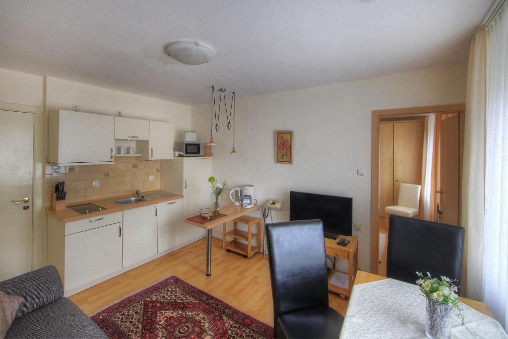 Kuchyň nebo kuchyňský kout v ubytování Aparthotel Klara
