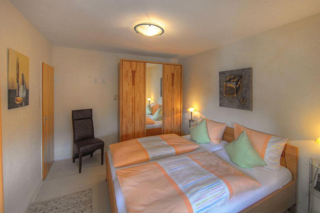 Postel nebo postele na pokoji v ubytování Aparthotel Klara