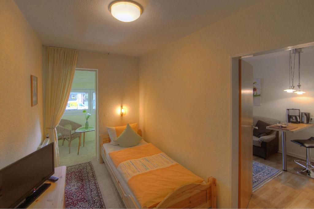 Postel nebo postele na pokoji v ubytování Aparthotel Klara