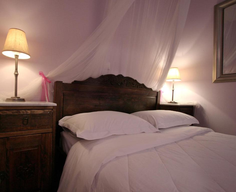Postel nebo postele na pokoji v ubytování Meliti Guesthouse