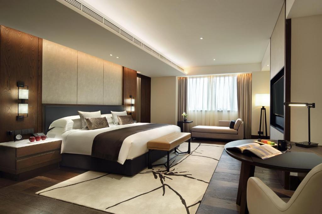 Postel nebo postele na pokoji v ubytování InterContinental Shanghai Hongqiao NECC by IHG