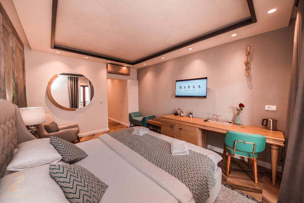 Postel nebo postele na pokoji v ubytování Barka B'n'B - Elegant Seaview Rooms