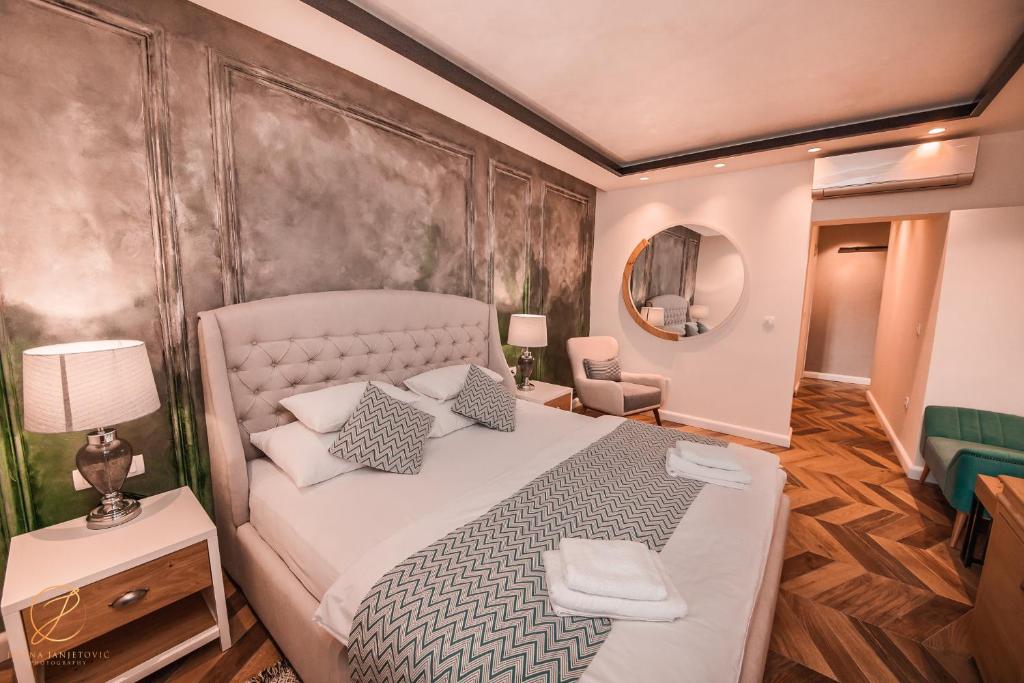Postel nebo postele na pokoji v ubytování Barka B'n'B - Elegant Seaview Rooms
