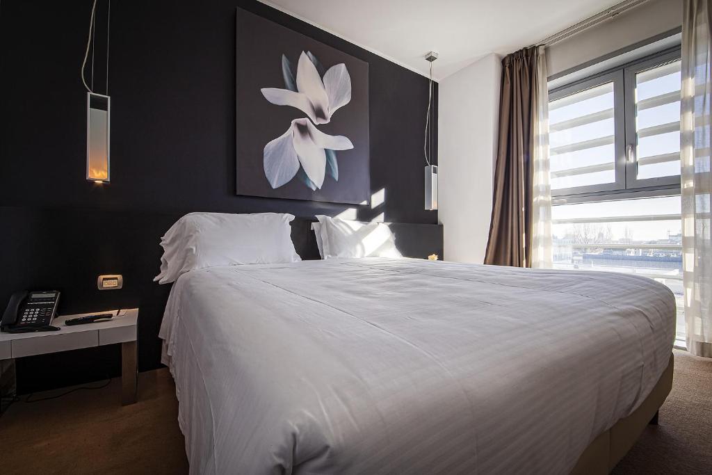 Postel nebo postele na pokoji v ubytování Hotel For You