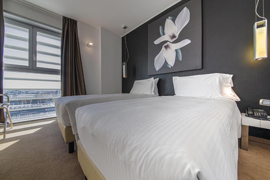 Postel nebo postele na pokoji v ubytování Hotel For You