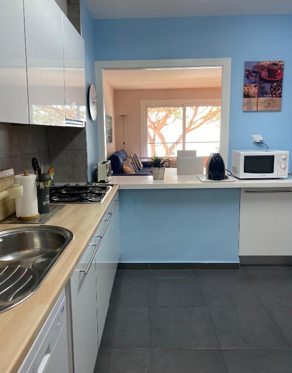 A kitchen or kitchenette at Musclera