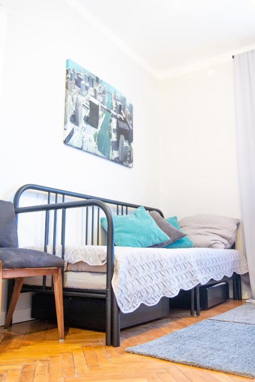Postel nebo postele na pokoji v ubytování AL-DOM apartamenty Apartament Stary Park