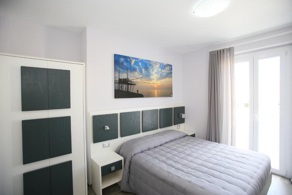 Postel nebo postele na pokoji v ubytování Green Door