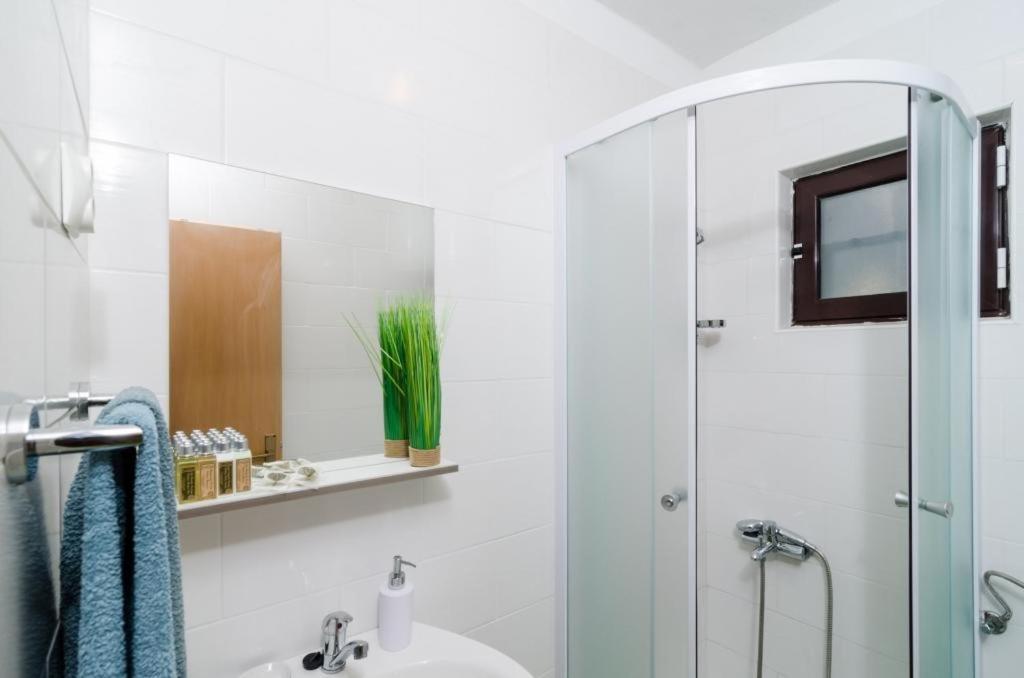 Koupelna v ubytování Apartments Ammos