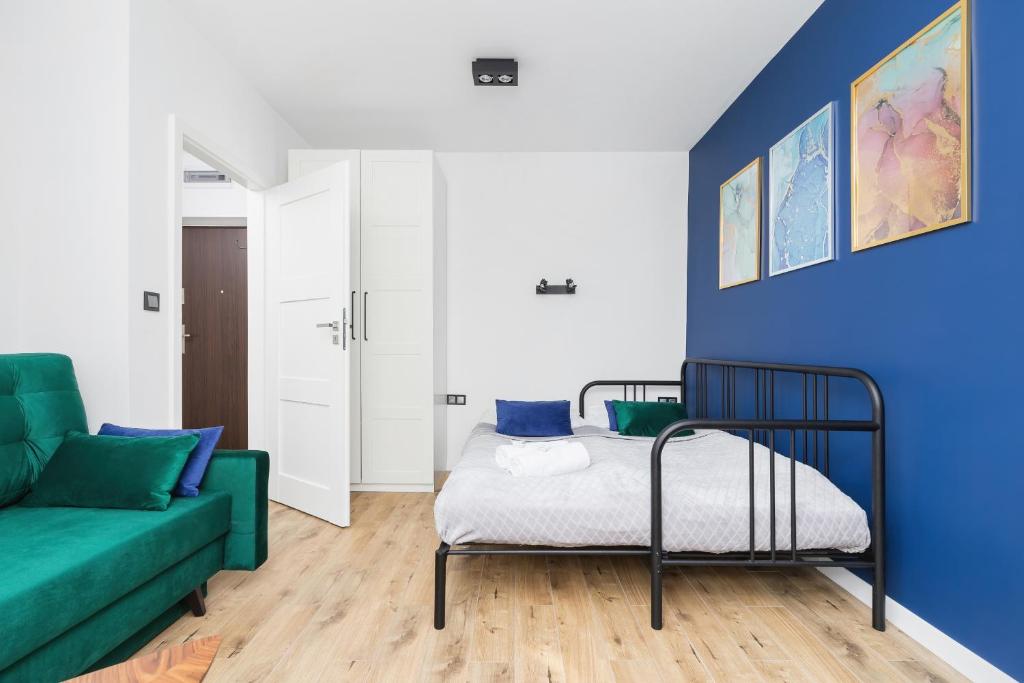 Posteľ alebo postele v izbe v ubytovaní Studio Spokojna Kraków by Noclegi Renters