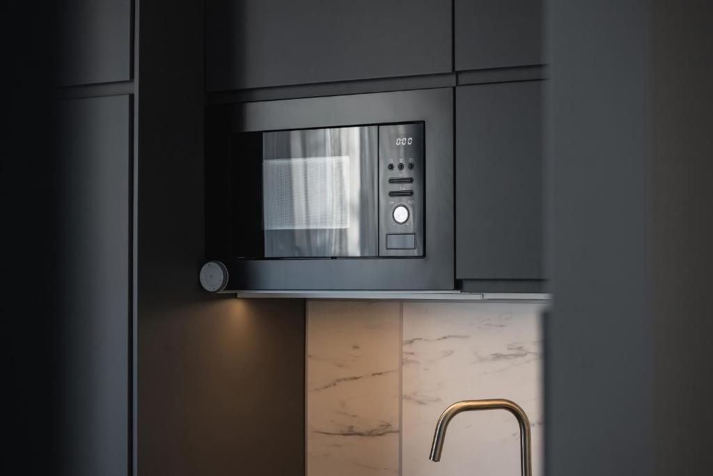 Kuchyňa alebo kuchynka v ubytovaní Studio Spokojna Kraków by Noclegi Renters