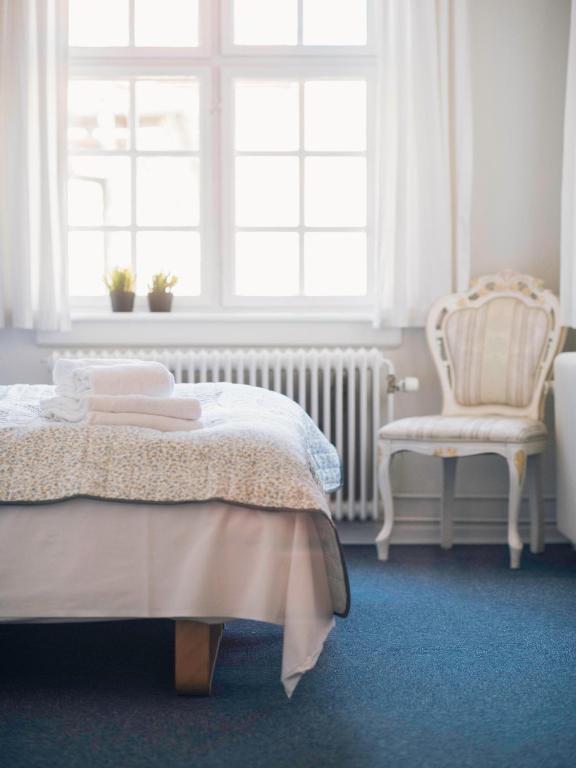 Postel nebo postele na pokoji v ubytování Hotel Faaborg
