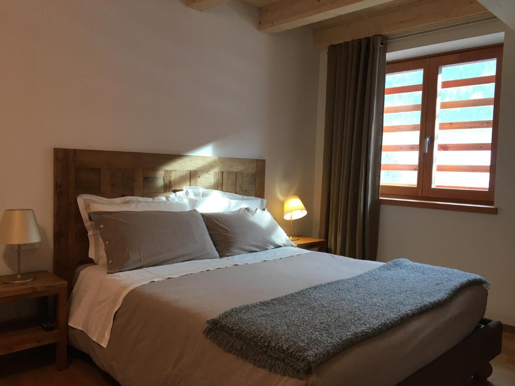 Letto o letti in una camera di B & B Chalet Plan