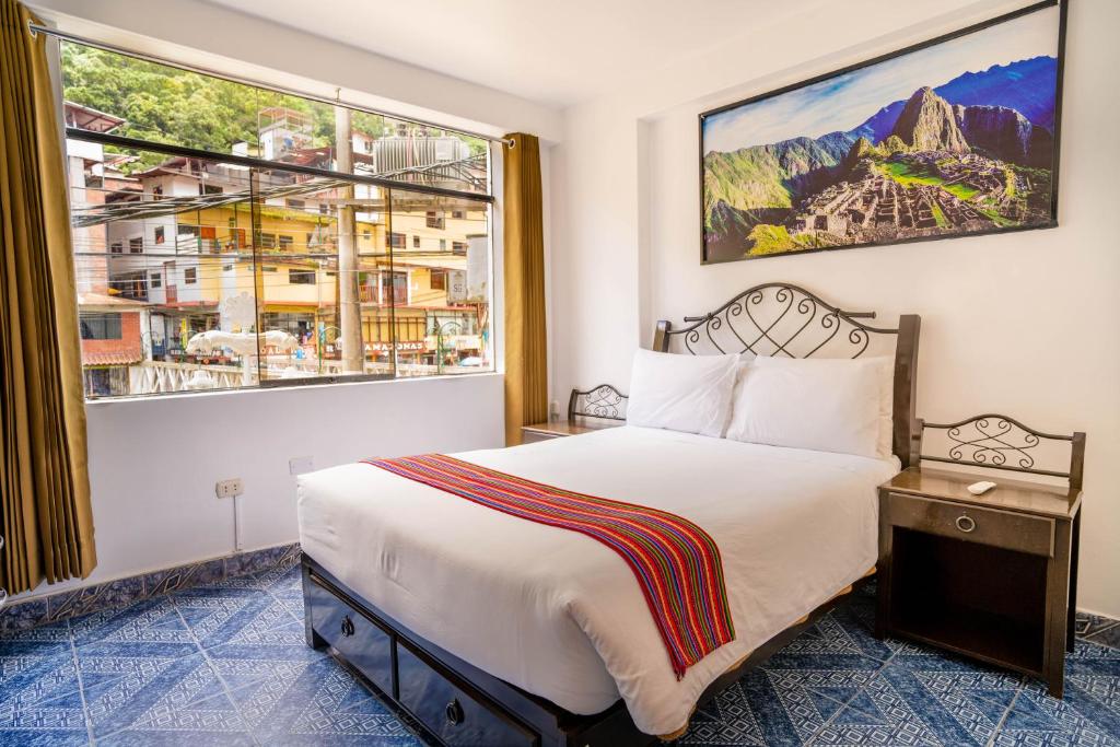 Voodi või voodid majutusasutuse Hotel Machupicchu Inn toas
