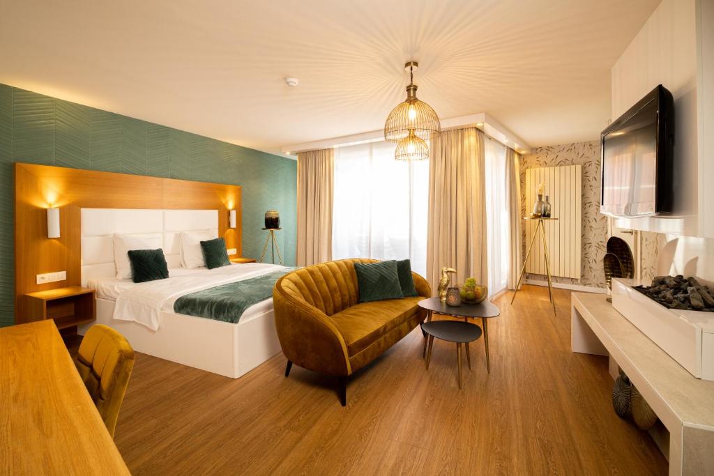Postel nebo postele na pokoji v ubytování Van der Valk Hotel Beveren