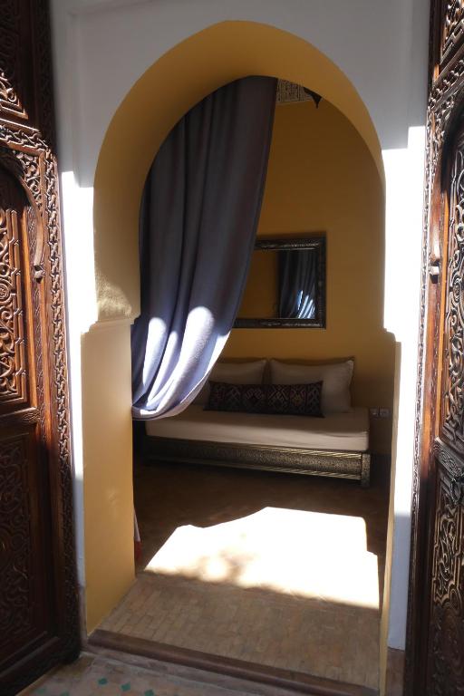 Postel nebo postele na pokoji v ubytování Riad Smara