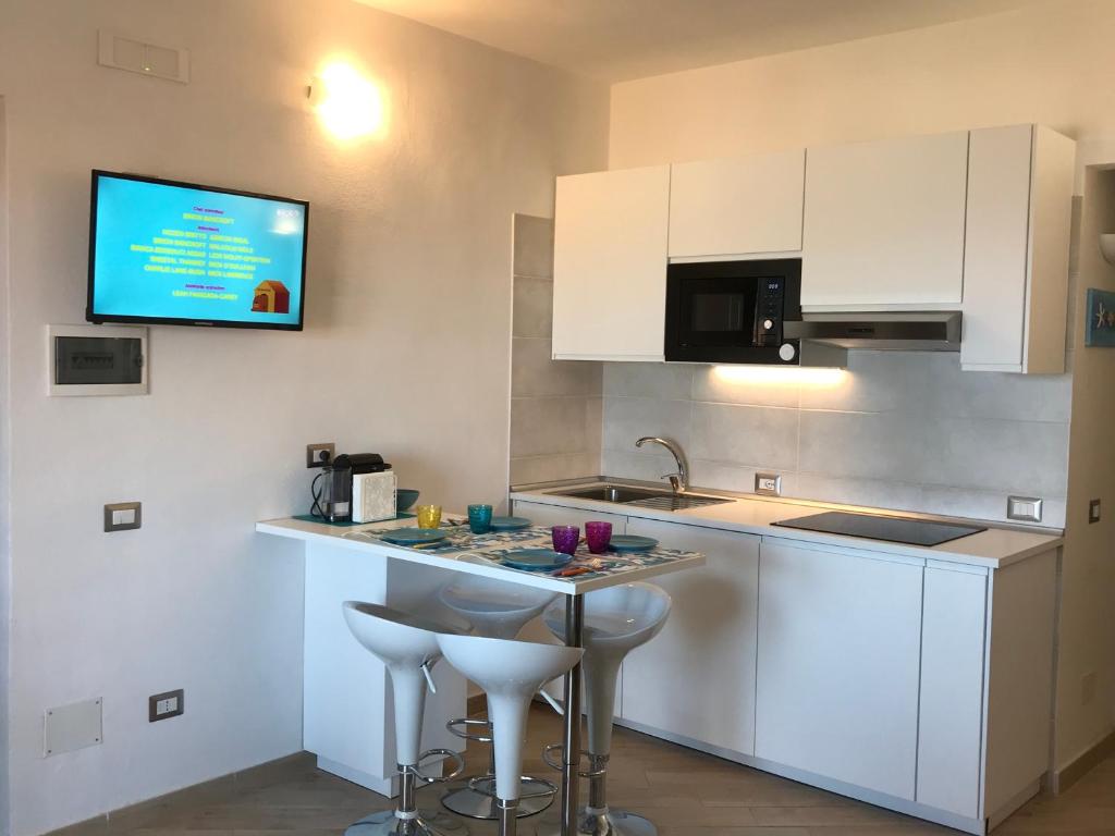 Kuchnia lub aneks kuchenny w obiekcie Charme House Palau