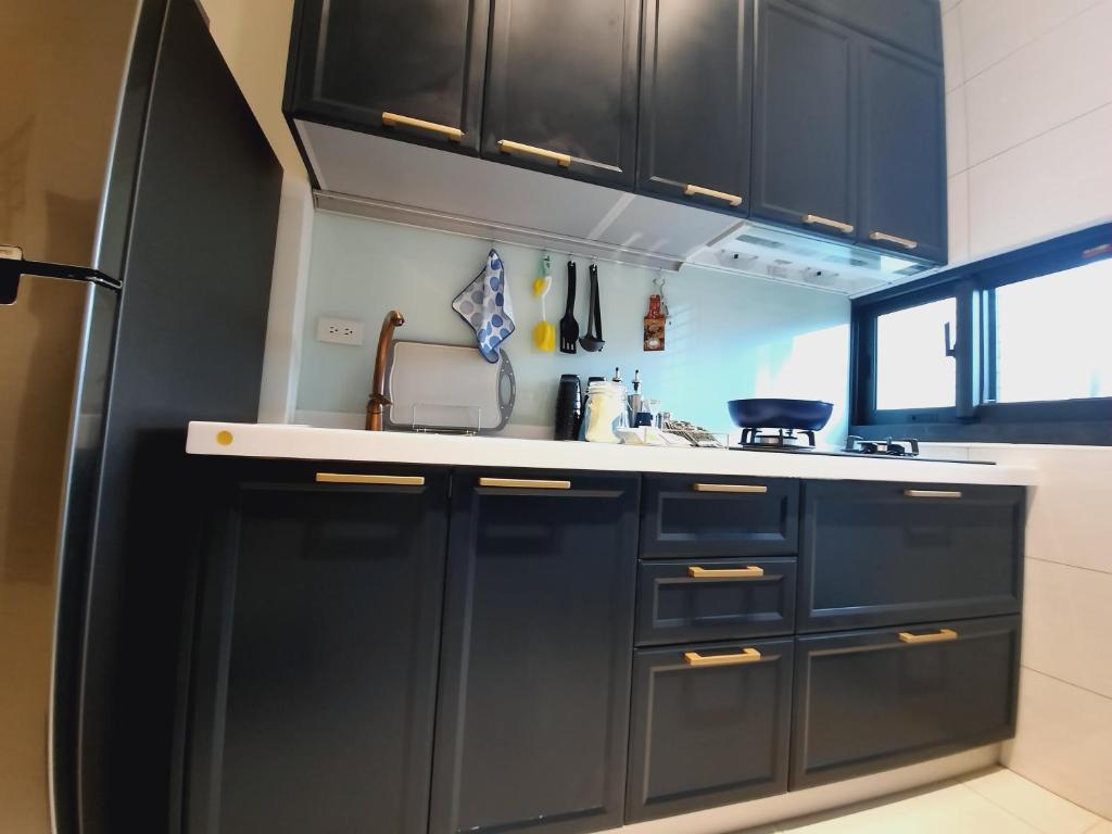 Kuchyň nebo kuchyňský kout v ubytování 3Kiss Homestay