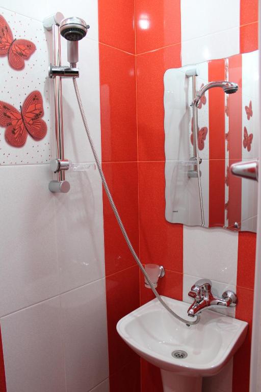 Koupelna v ubytování Princ Plaza Hotel