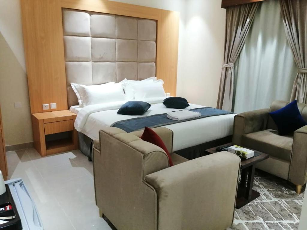 منازل الطيف للوحدات السكنية - Deluxe Room (2 Adults + 1 Child)