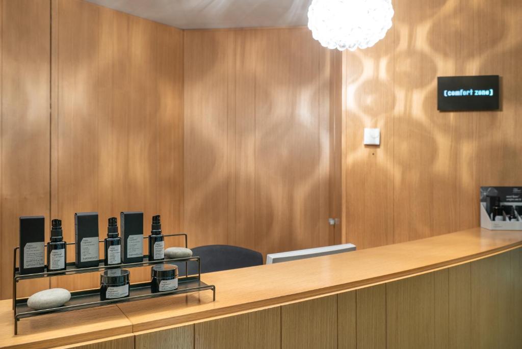 Telewizja i/lub zestaw kina domowego w obiekcie Hotel Chalet Del Brenta