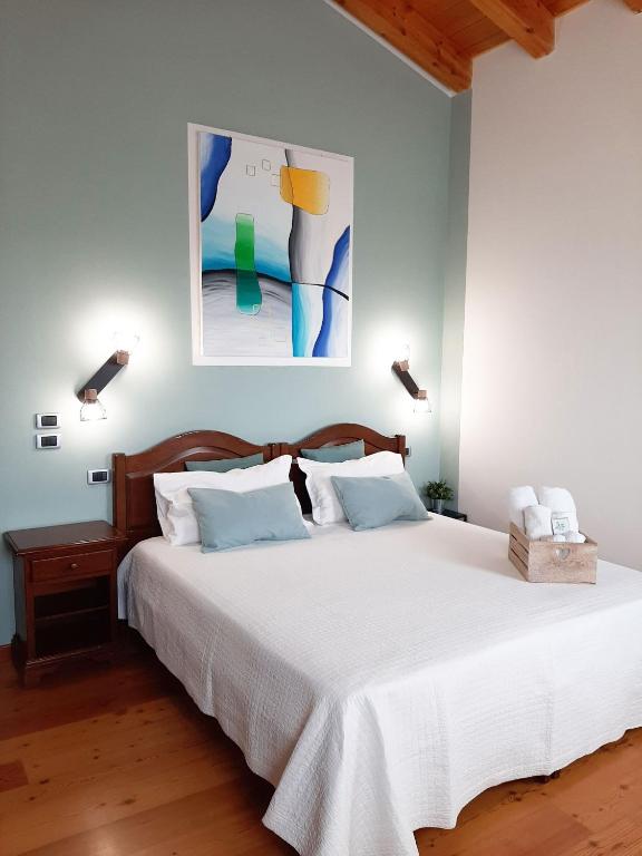 Postel nebo postele na pokoji v ubytování Agriturismo Le Cipressine