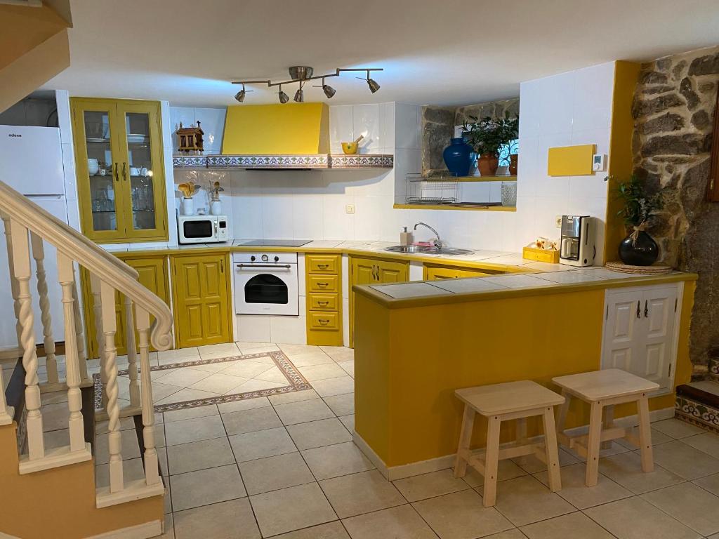 Kuchyň nebo kuchyňský kout v ubytování Casa Rualeira