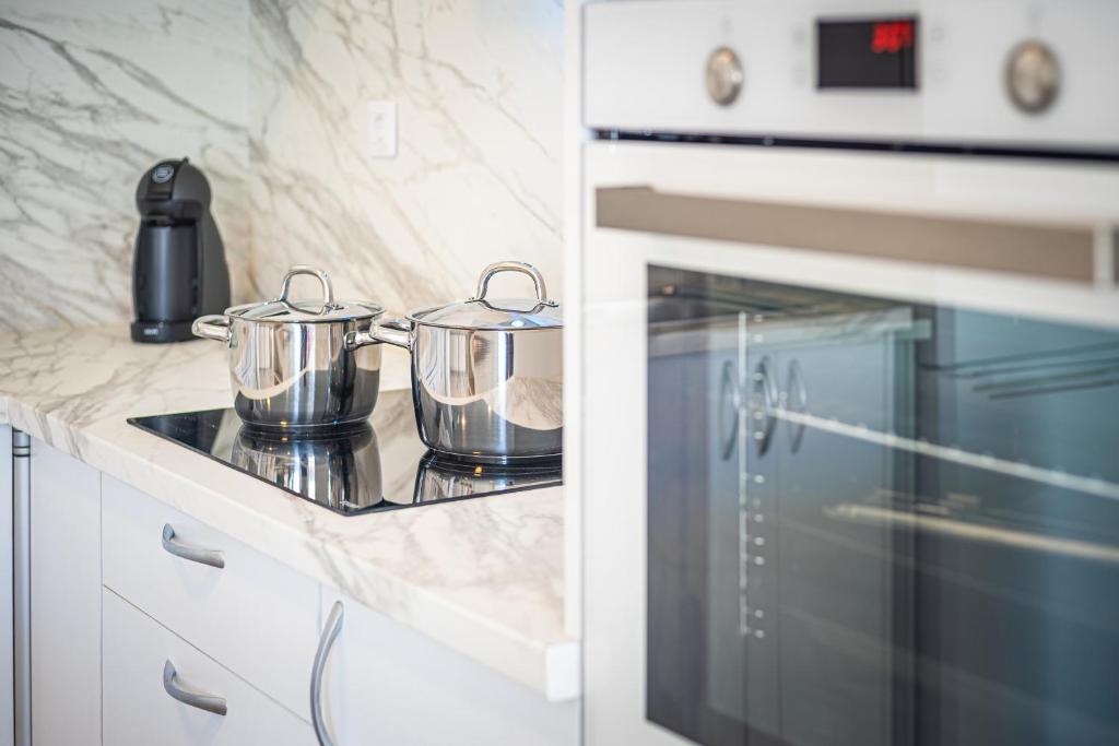 A kitchen or kitchenette at White Deluxe Caleta by Sea You There Fuerteventura