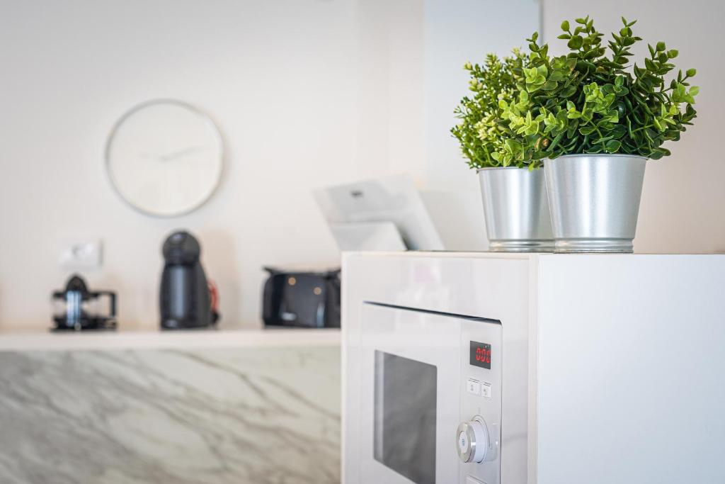 A kitchen or kitchenette at White Deluxe Caleta by Sea You There Fuerteventura