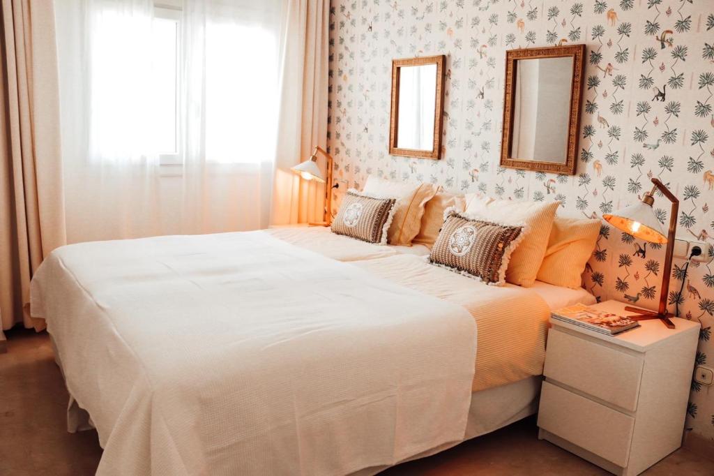 Cama ou camas em um quarto em Villa Piccola by Cassai