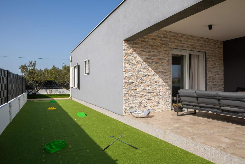 Vonkajšia záhrada v ubytovaní Villa Millennium