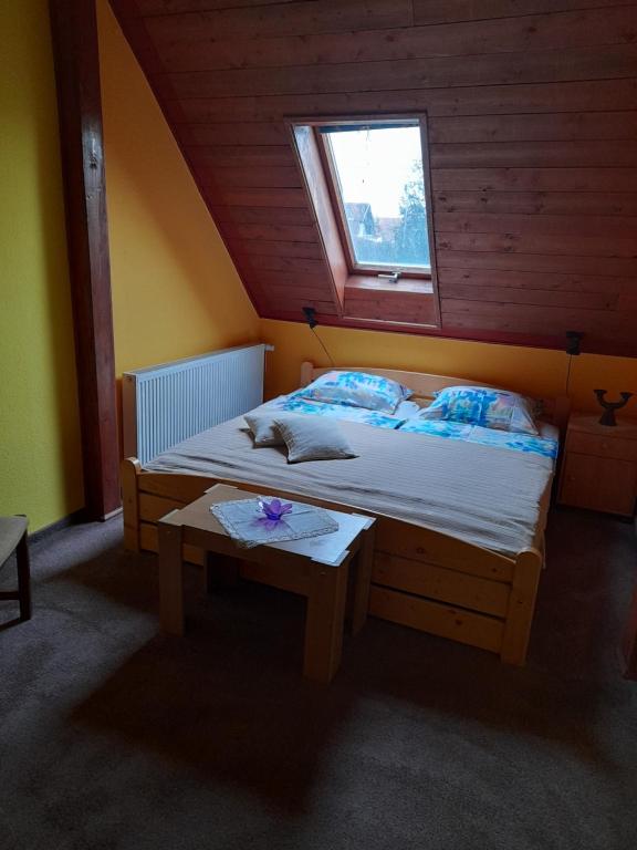 Postel nebo postele na pokoji v ubytování Agave Apartman