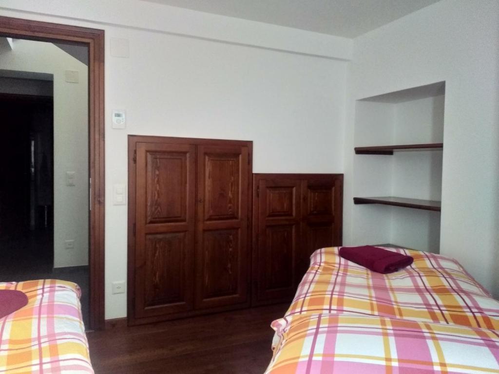 Rúm í herbergi á Appartement "Luigi Loft"
