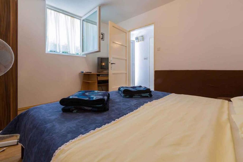 Posteľ alebo postele v izbe v ubytovaní Apartment in Crikvenica 39084