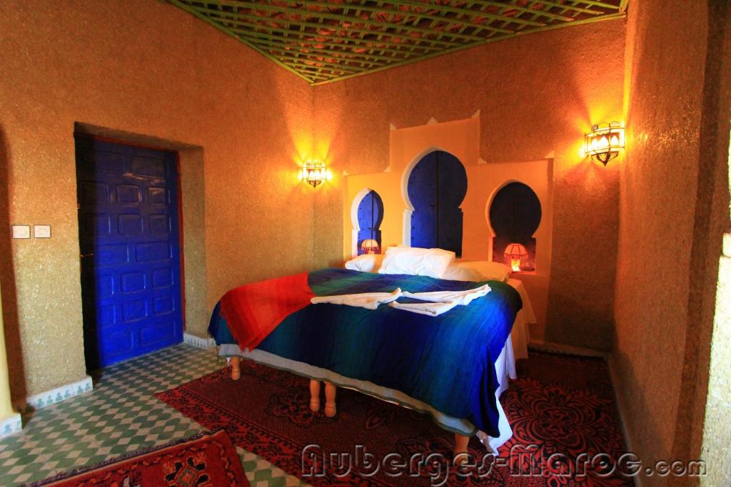 Postel nebo postele na pokoji v ubytování Kasbah Hotel Panorama