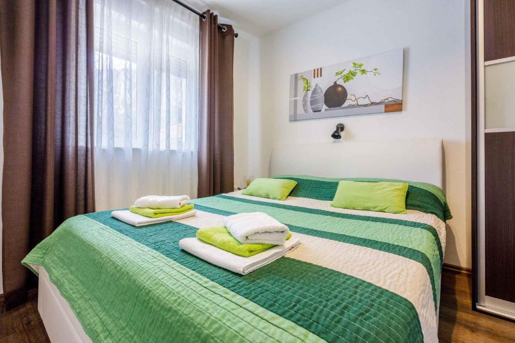 Postel nebo postele na pokoji v ubytování Holiday home in Grizane 39291