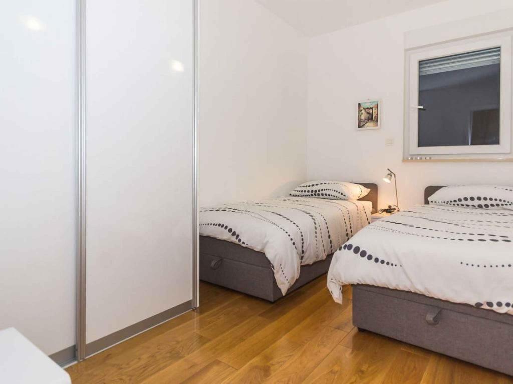 Posteľ alebo postele v izbe v ubytovaní Apartment in Njivice/Insel Krk 35106
