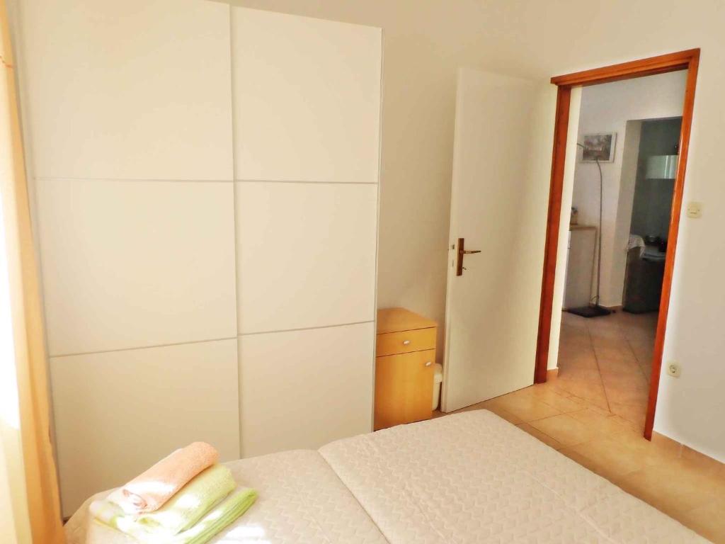 Posteľ alebo postele v izbe v ubytovaní Apartment in Rovanjska 37204