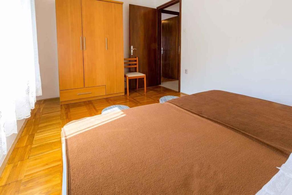 Posteľ alebo postele v izbe v ubytovaní Apartment in Crikvenica 14098