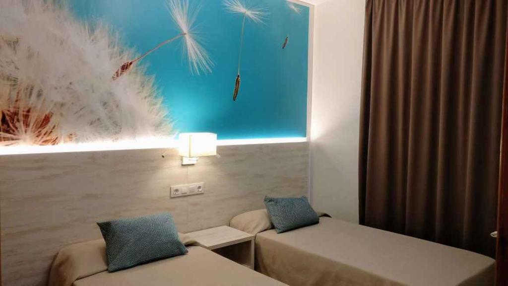 Posteľ alebo postele v izbe v ubytovaní Apartments Lloret de Mar/Costa Brava 3515
