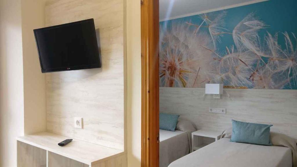 Televízia a/alebo spoločenská miestnosť v ubytovaní Apartments Lloret de Mar/Costa Brava 3515