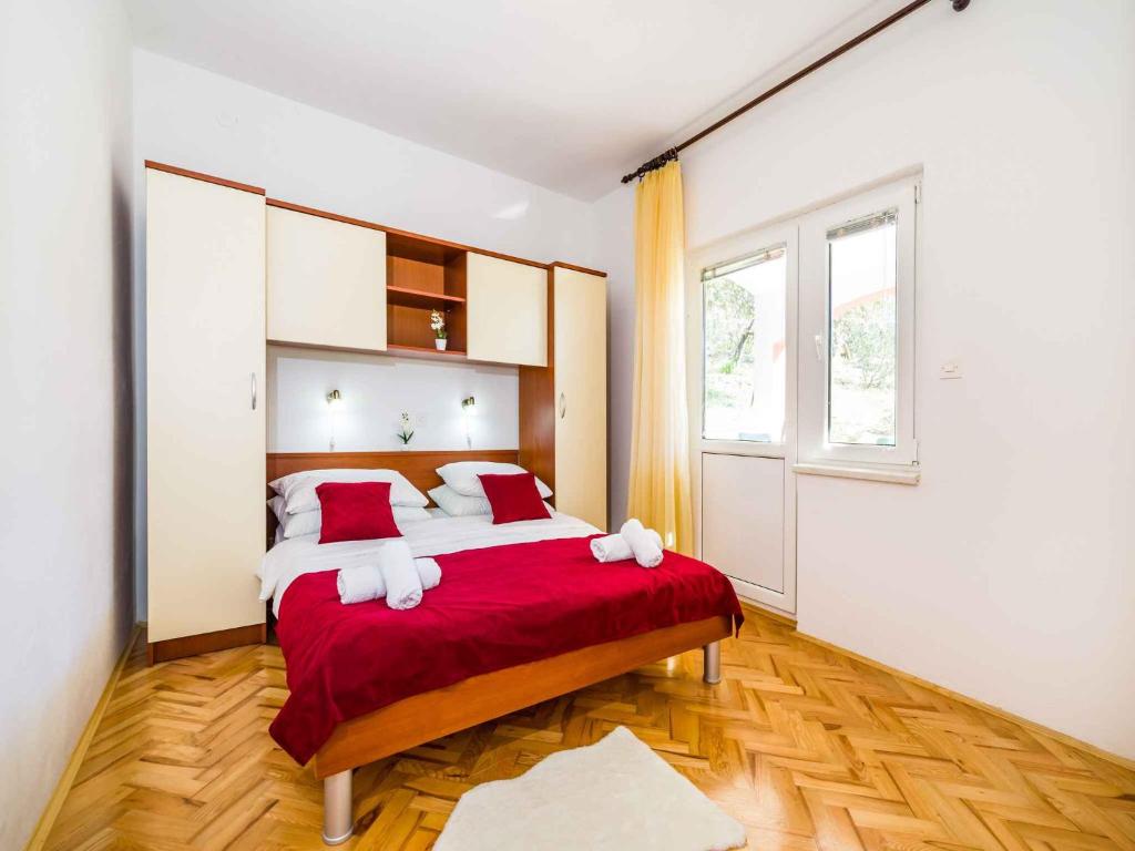 Posteľ alebo postele v izbe v ubytovaní Holiday home in Jasenice 33303