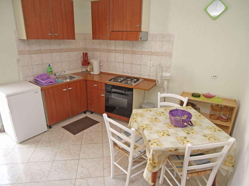 Kuchyň nebo kuchyňský kout v ubytování Apartment in Veli Losinj 14933