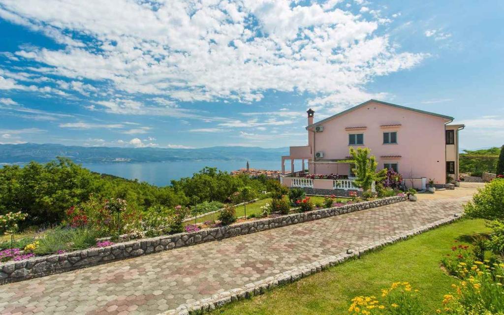 a house with a view of the water at Apartment in Vrbnik/Insel Krk 35843 in Vrbnik