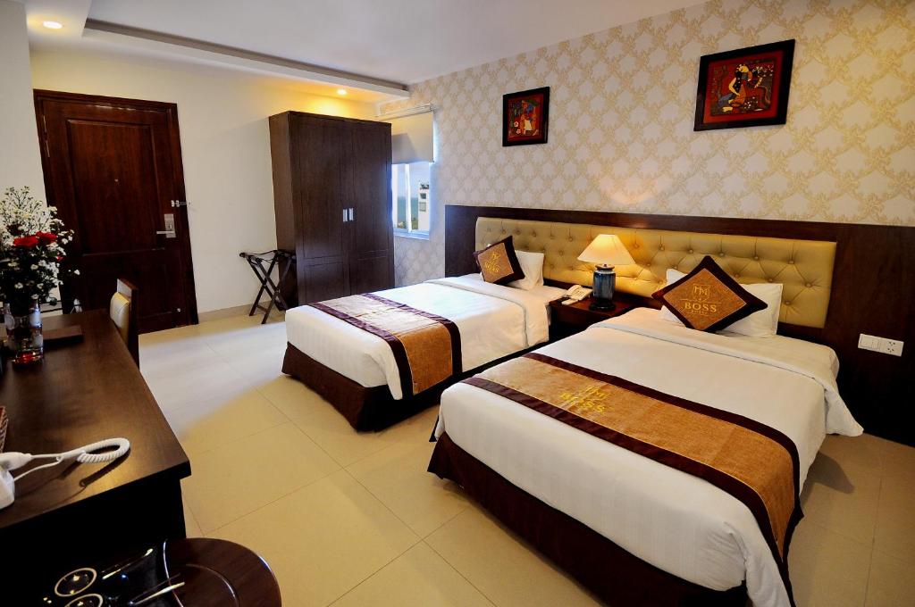 Boss Hotel - Deluxe Double O Twin Sala Con Vista Al Mar Parcial