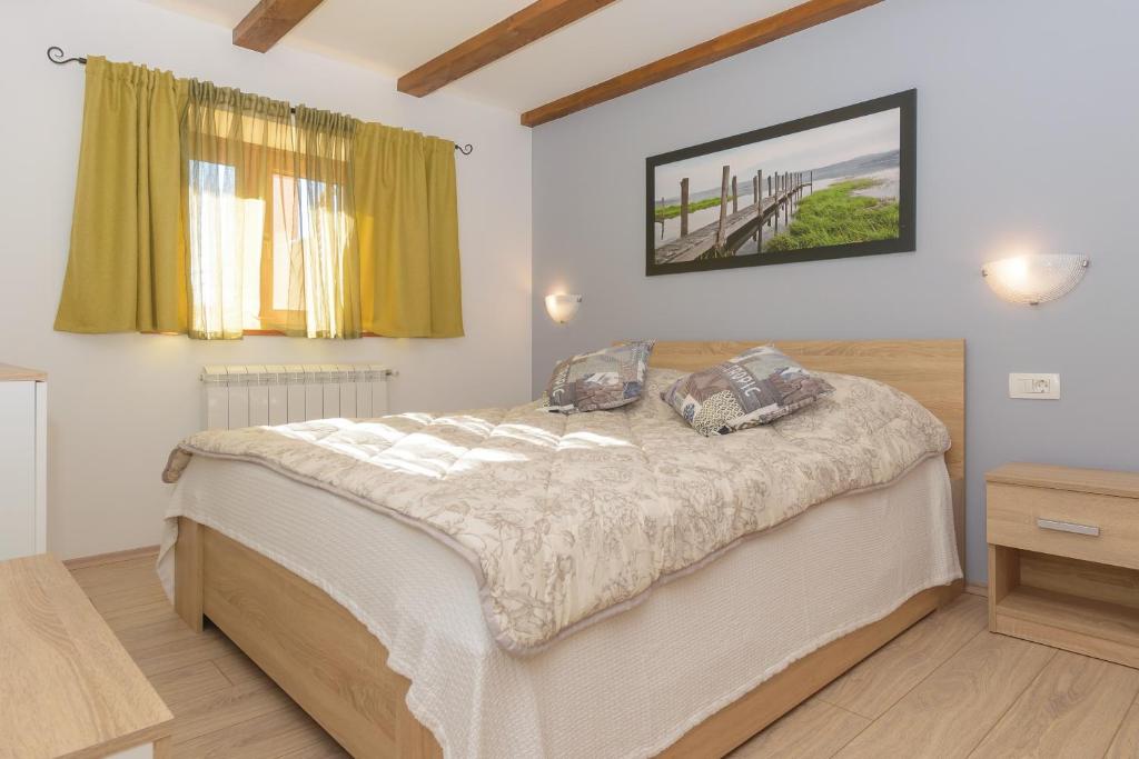 Postel nebo postele na pokoji v ubytování Spacious holiday home Guran