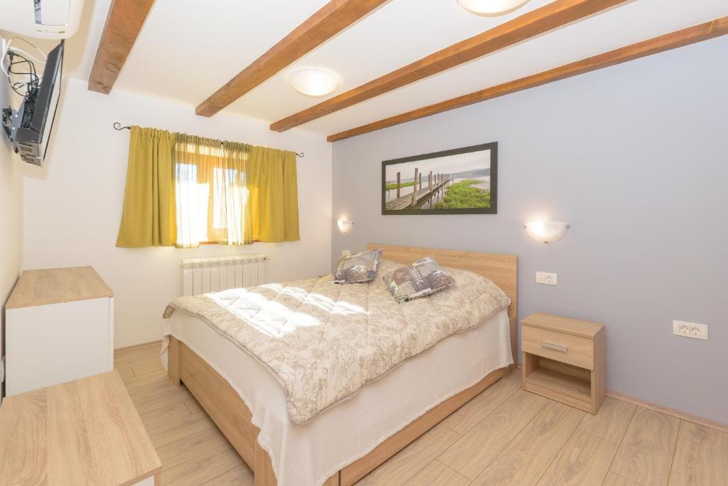Postel nebo postele na pokoji v ubytování Spacious holiday home Guran